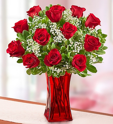 Blooming Loveâ„¢  Premium Red Roses in Red Vase